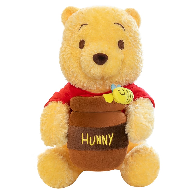 Peluche Winnie L'ourson avec son pot de miel